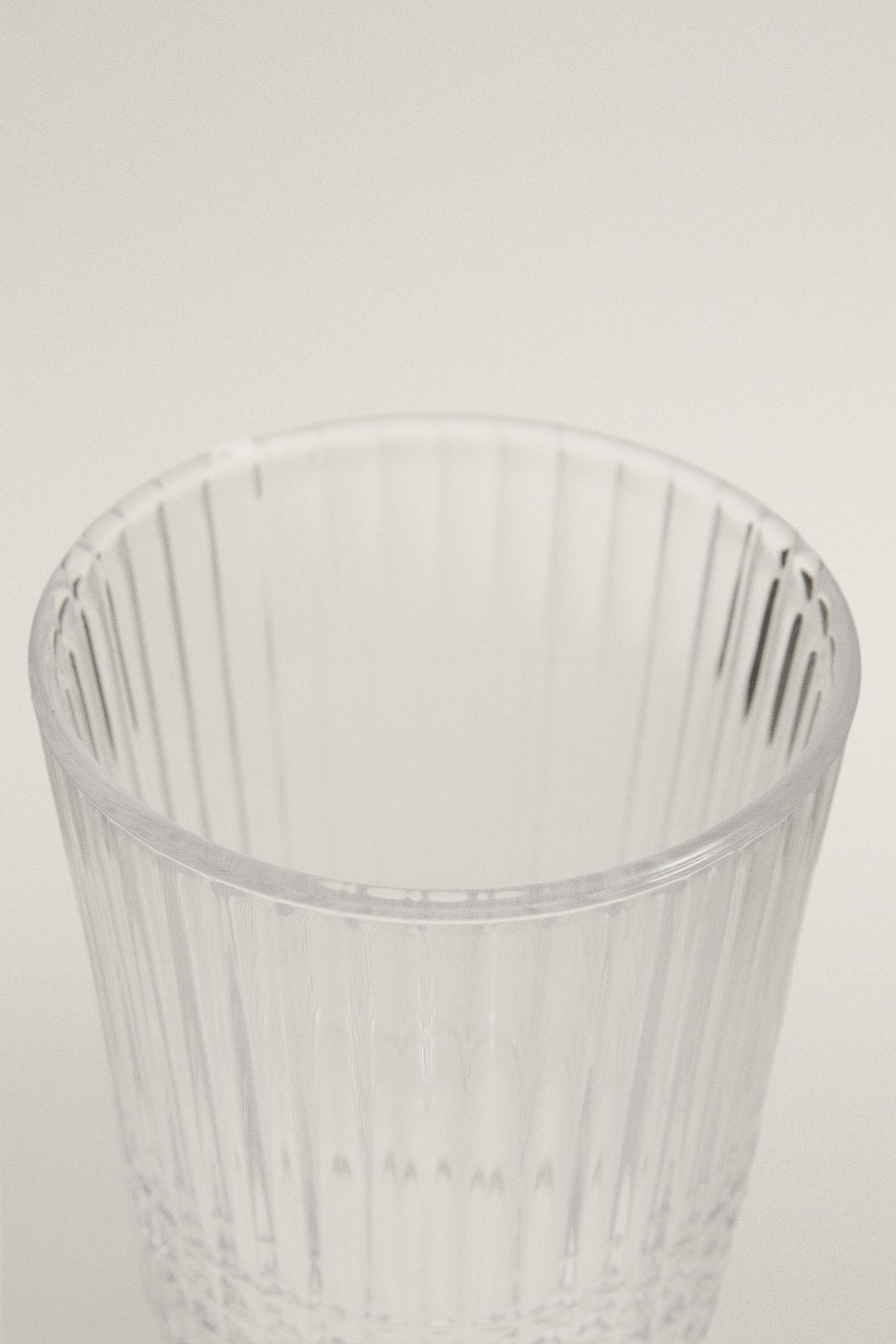 GLASS TUMBLER WITH RAISED GEOMETRIC DESIGN